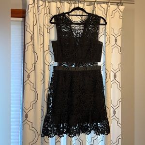 Romeo and juliette couture crocheted dress. Liner at bandeau and skirt locations